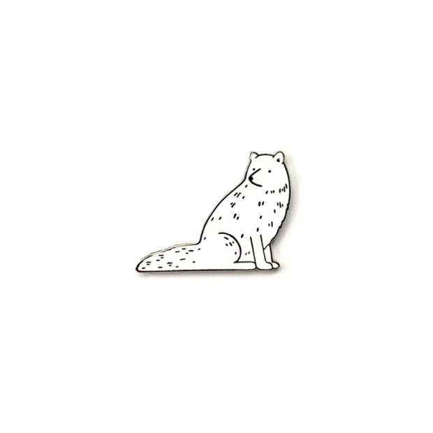 Arctic Fox enamel pin badge on a backing card showing the artist name and name of animal.